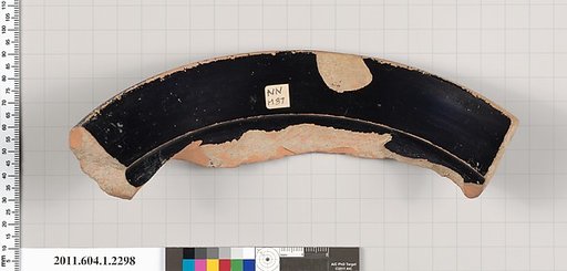 Terracotta fragment of a kylix (drinking cup)