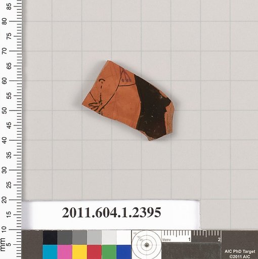 Terracotta fragment of a kylix (drinking cup)