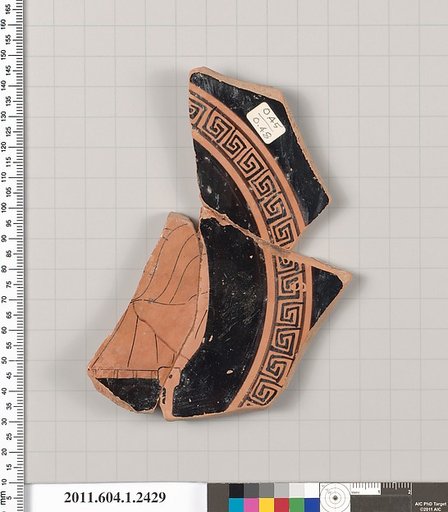 Terracotta fragment of a kylix (drinking cup)