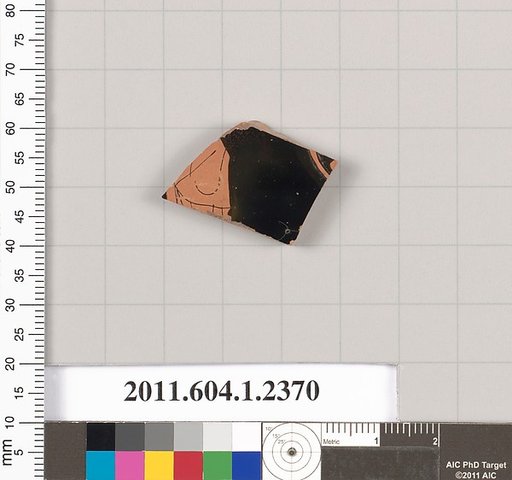 Terracotta fragment of a kylix (drinking cup)