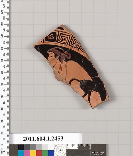 Terracotta fragment of a kylix (drinking cup)