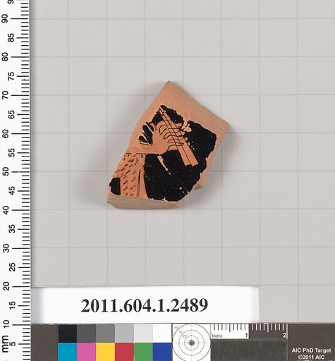 Terracotta fragment of a kylix (drinking cup)