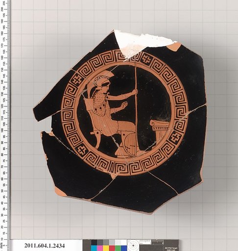 Terracotta fragment of a kylix (drinking cup)