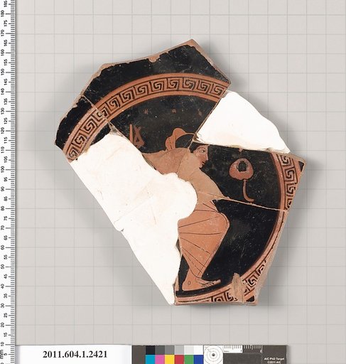 Terracotta fragment of a kylix (drinking cup)