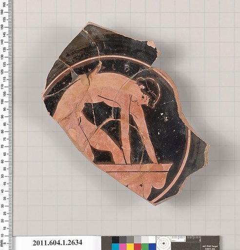 Terracotta fragment of a kylix (drinking cup)