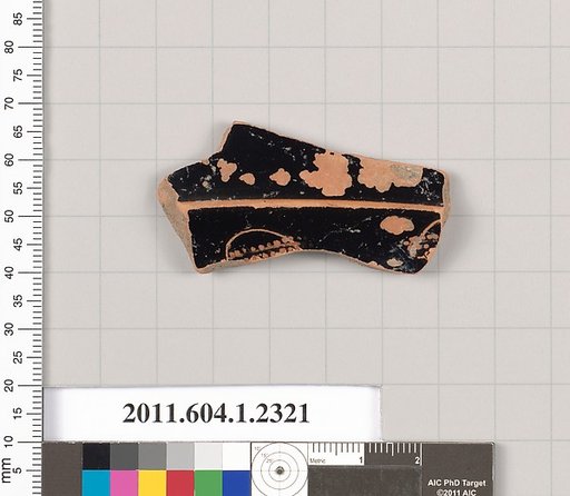 Terracotta fragment of a kylix (drinking cup)