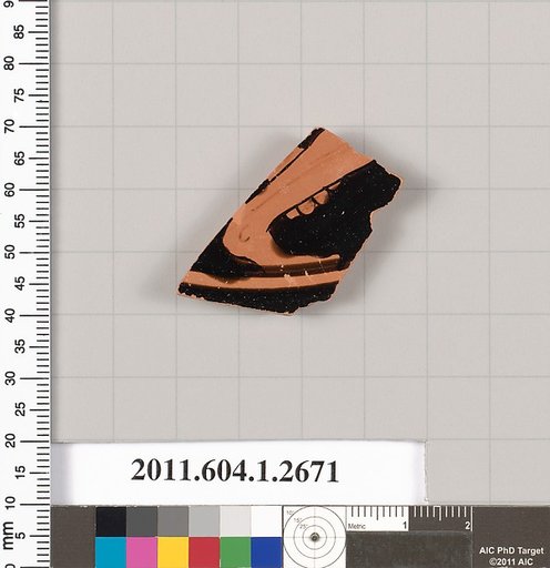 Terracotta fragment of a kylix (drinking cup)