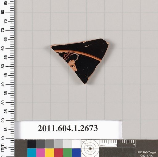 Terracotta fragment of a kylix (drinking cup)