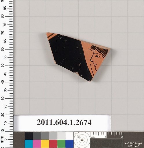 Terracotta fragment of a kylix (drinking cup)