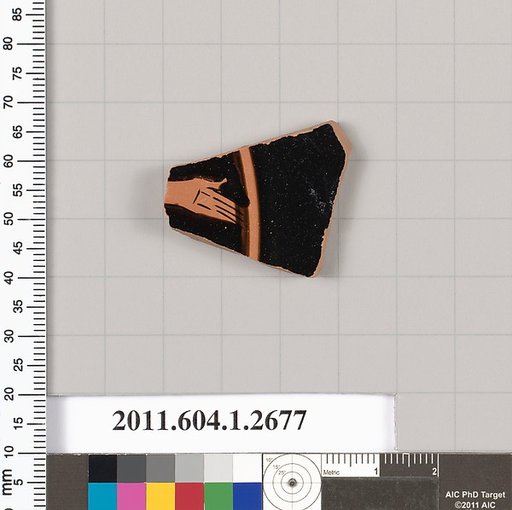Terracotta fragment of a kylix (drinking cup)