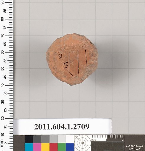 Terracotta fragment of a kylix (drinking cup)