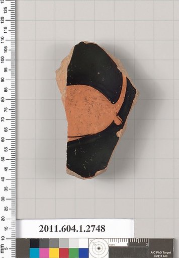 Terracotta fragment of a kylix (drinking cup)
