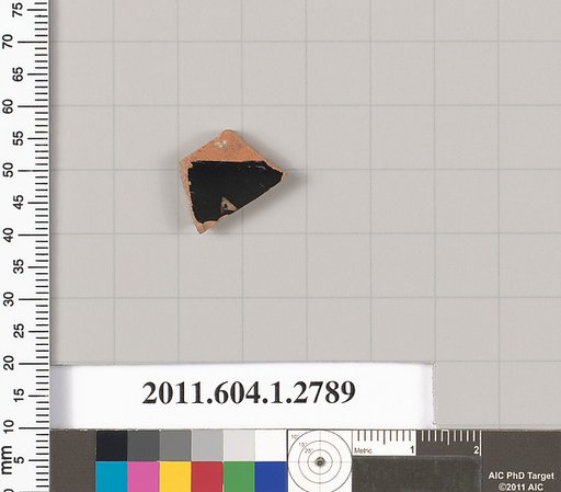 Terracotta fragment of a kylix (drinking cup)