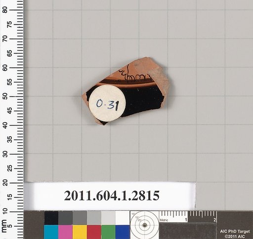 Terracotta fragment of a kylix (drinking cup)