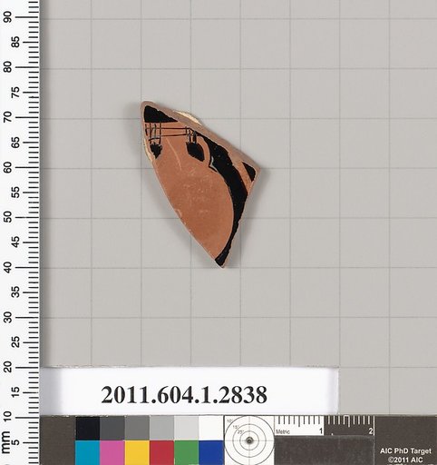 Terracotta fragment of a kylix (drinking cup)