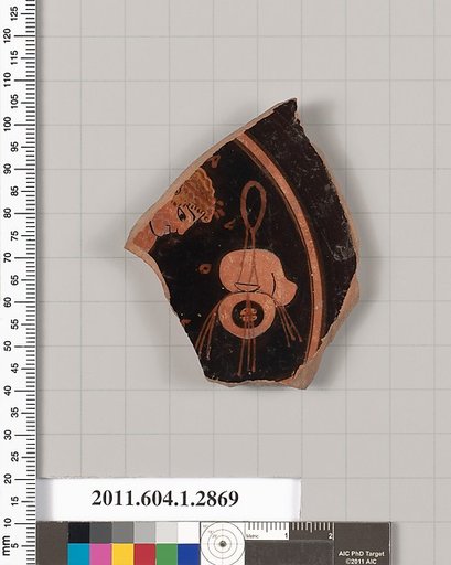 Terracotta fragment of a kylix (drinking cup)