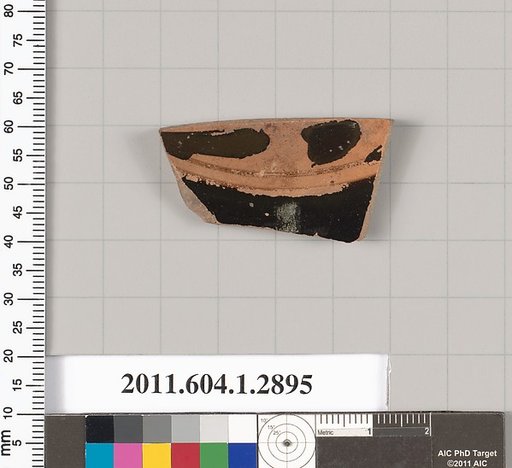 Terracotta fragment of a kylix (drinking cup)
