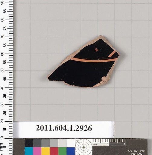 Terracotta fragment of a kylix (drinking cup)