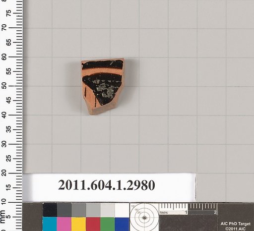 Terracotta fragment of a kylix (drinking cup)