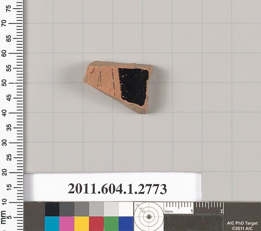Terracotta fragment of a kylix (drinking cup)