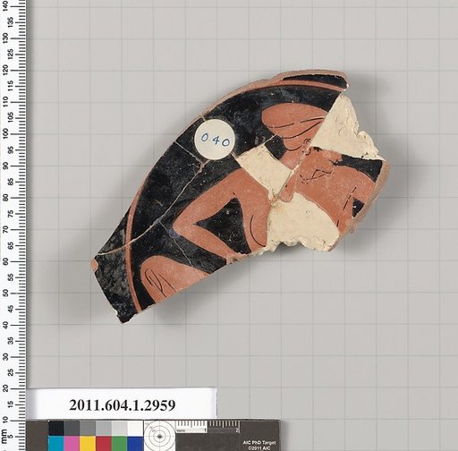 Terracotta fragment of a kylix (drinking cup)