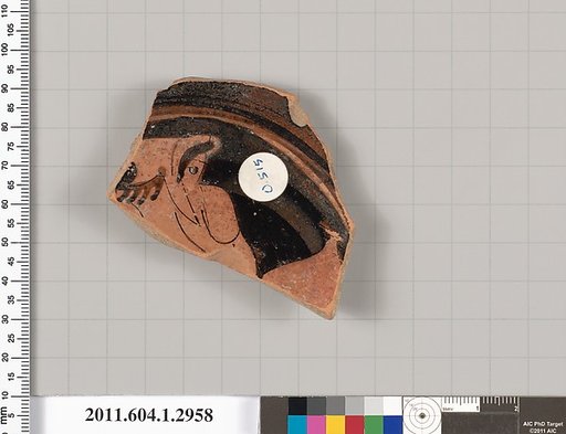 Terracotta fragment of a kylix (drinking cup)