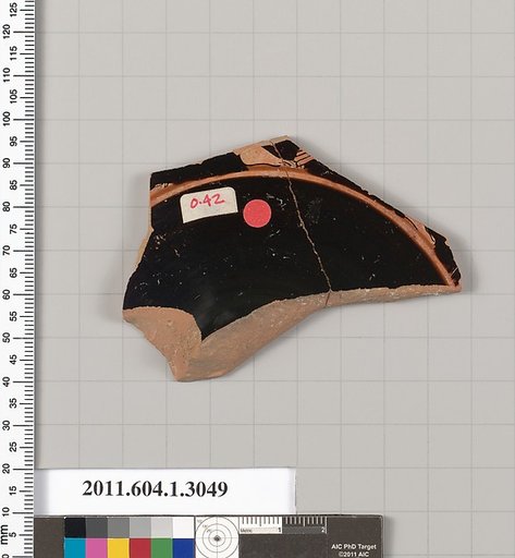 Terracotta fragment of a kylix (drinking cup)