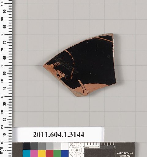 Terracotta fragment of a kylix (drinking cup)