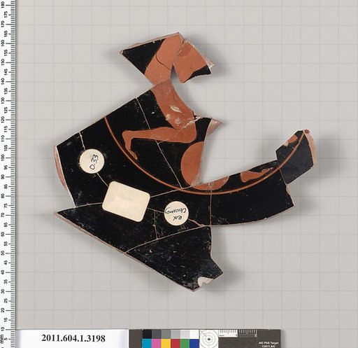 Terracotta fragment of a kylix (drinking cup)
