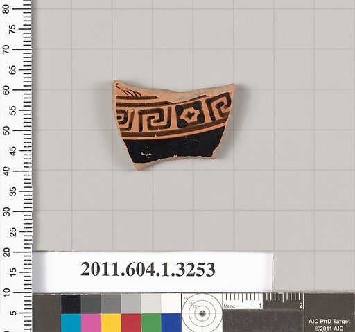 Terracotta fragment of a kylix (drinking cup)