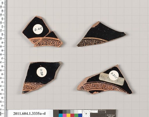 Terracotta fragments of kylikes (drinking cups)