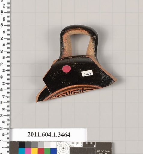 Terracotta fragment of a kylix (drinking cup)