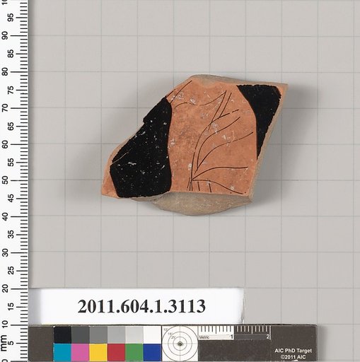 Terracotta fragment of a kylix (drinking cup)
