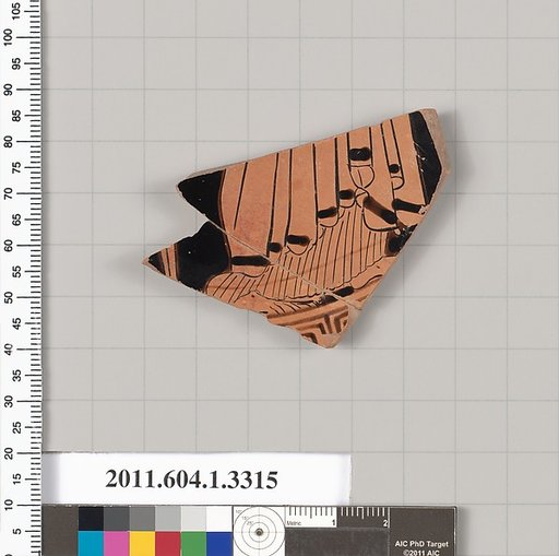 Terracotta fragment of a kylix (drinking cup)