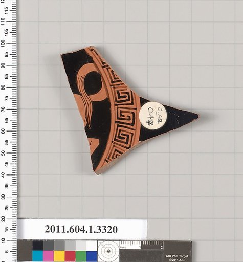 Terracotta fragment of a kylix (drinking cup)