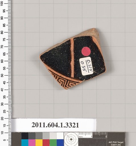 Terracotta fragment of a kylix (drinking cup)