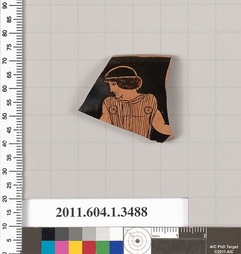 Terracotta fragment of a kylix (drinking cup)
