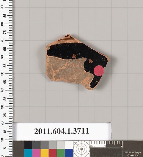 Terracotta fragment of a kylix (drinking cup)