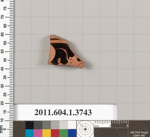 Terracotta fragment of a kylix (drinking cup)