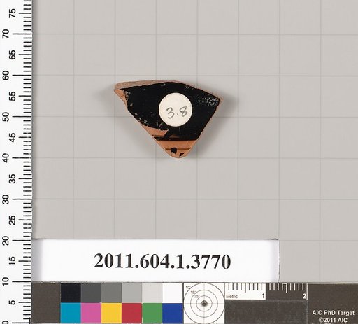 Terracotta fragment of a kylix (drinking cup)