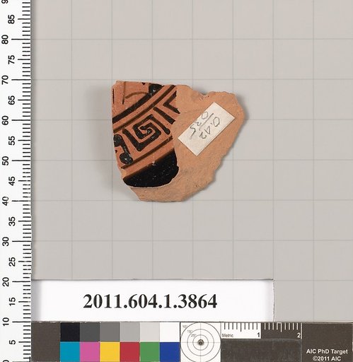 Terracotta fragment of a kylix (drinking cup)
