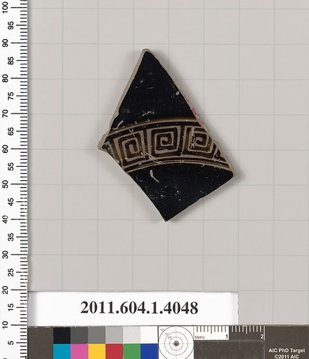 Terracotta fragment of a kylix (drinking cup)