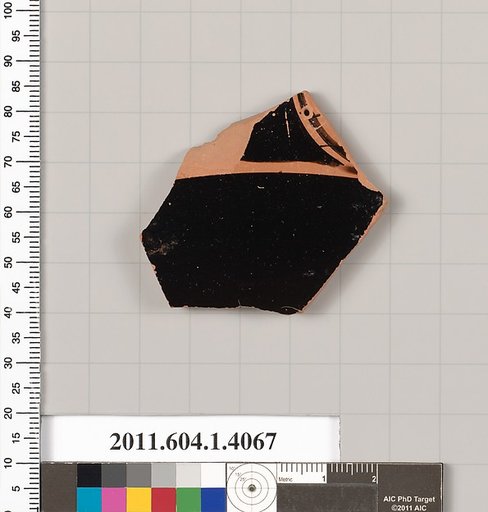 Terracotta fragment of a kylix (drinking cup)