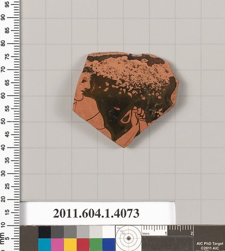 Terracotta rim fragment of a kylix (drinking cup)