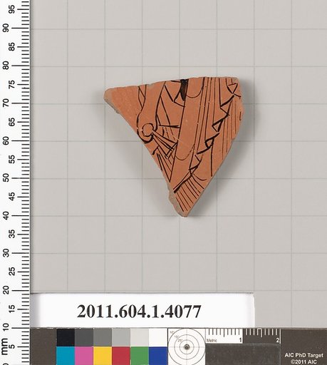 Terracotta fragment of a kylix (drinking cup)
