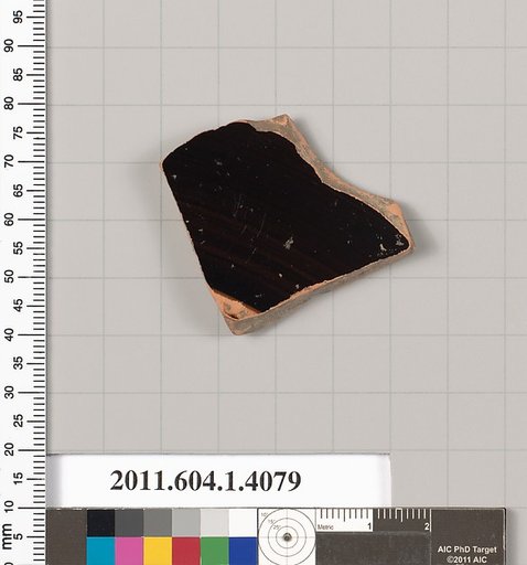 Terracotta fragment of a kylix (drinking cup)