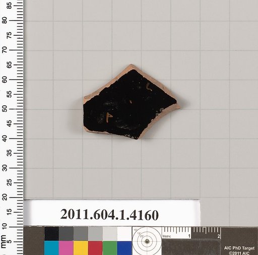 Terracotta fragment of a kylix (drinking cup)