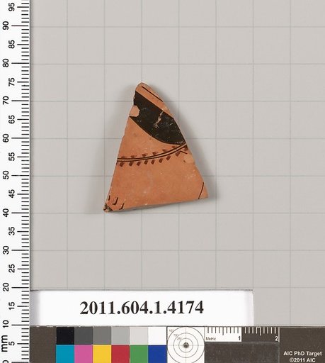Terracotta fragment of a kylix (drinking cup)