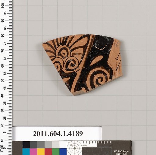 Terracotta fragment of a kylix (drinking cup)