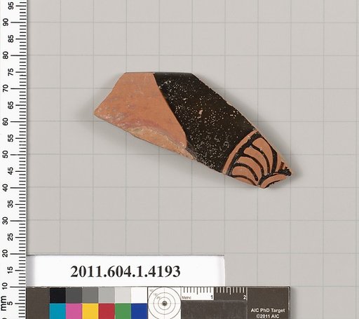 Terracotta rim fragment of a kylix (drinking cup)